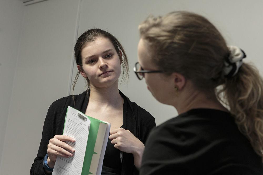 a woman conducting a consultation.