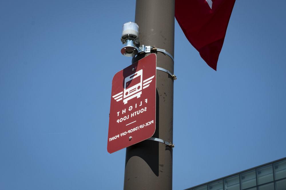 one of the FLIGHT shuttle stop signs on Main Campus.